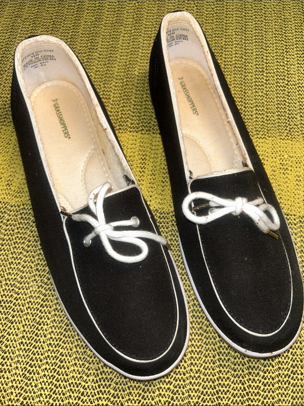 Grasshoppers Black Canvas Slip-On Loafers with White Trim and Bow Accent